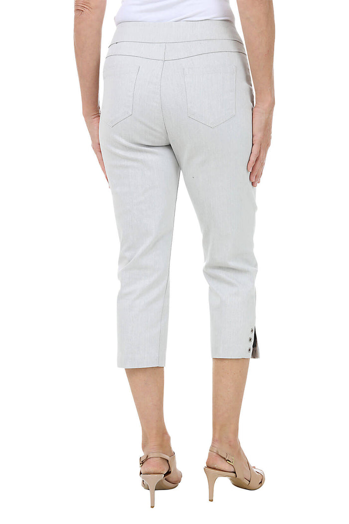 Light gray capri pants worn by a person on a white background. Back shot.