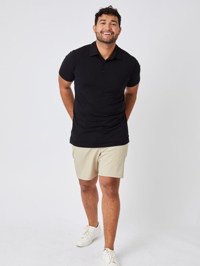 Matheus is 6', 210LBS and wears a size XL # All Black Performance Polo 3-pack Studio Model Size XL | Fresh Clean Threads
