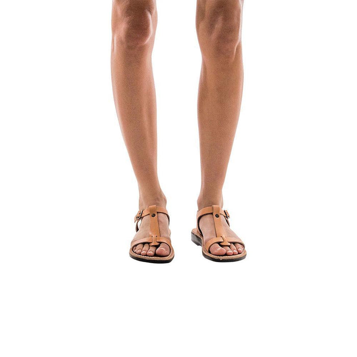 Model wearing Bathsheba tan, handmade leather sandals with back strap