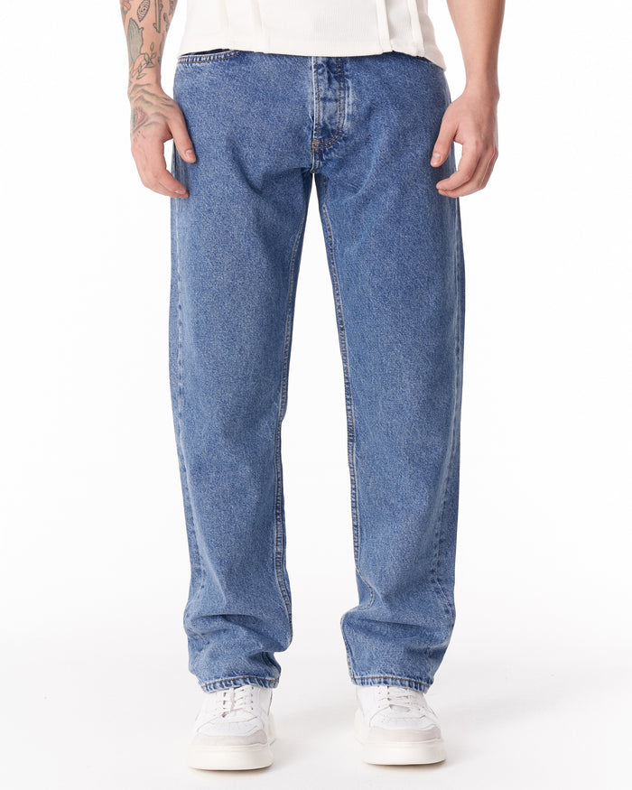 Martin Valen blue loose-fit men's jeans, full front view showing leg length and slightly stacked hem