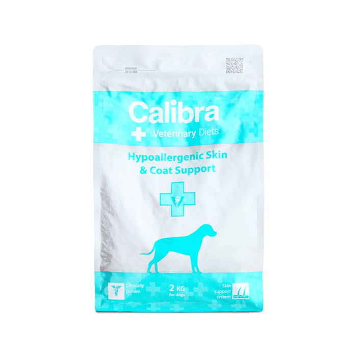 A stand-up pouch of Calibra Veterinary Diets Hypoallergenic Skin & Coat Support dog food, featuring a white and bright turquoise design with a dog silhouette.