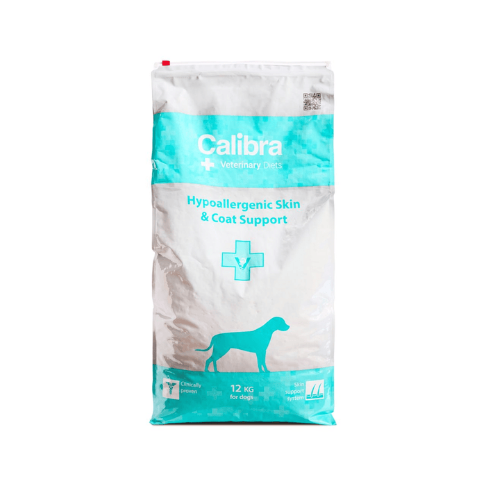 A 12 kg bag of Calibra Veterinary Care Hypoallergenic Skin & Coat Support dog food, featuring a white and teal design with a dog silhouette.
