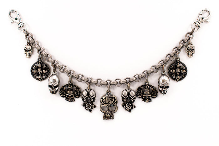 Charivari with various "skulls" in antique silver