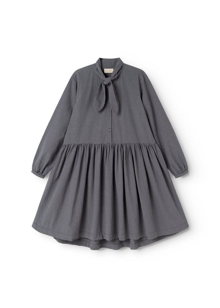 Dark gray dress with a bow at the neckline, button closure and pleated skirt.