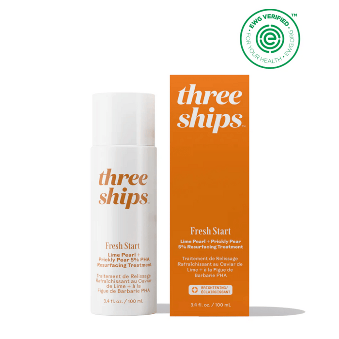 Bottle and orange box packaging of Fresh Start Lime Pearl + Prickly Pear 5% PHA Resurfacing Treatment | Three Ships skincare product with EWG Verified seal.