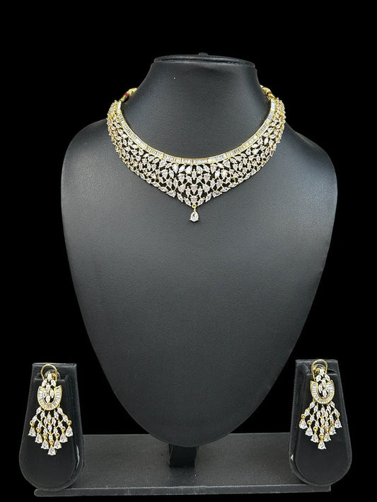 House Of Indian Wedding Attire gold-toned choker necklace with drop pendant and matching dangling earrings, adorned with clear cubic zirconia stones.