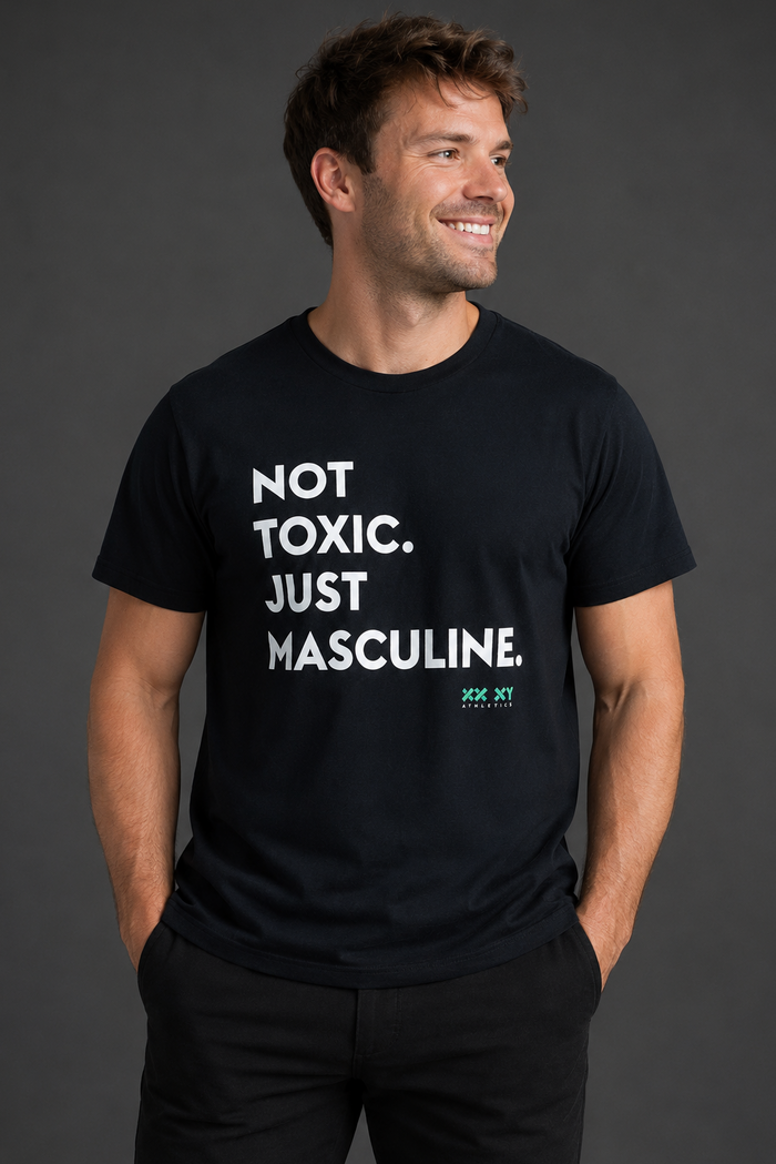 Man wearing a black t-shirt with white text on a gray background || Black