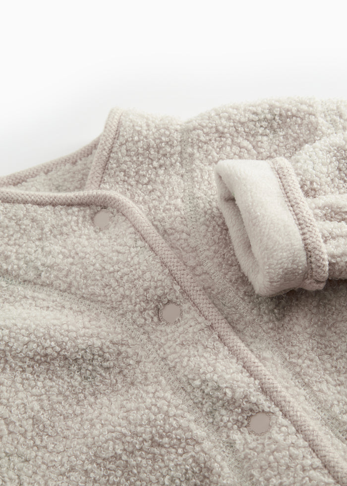 Beige fleece jacket with buttons and pockets for children