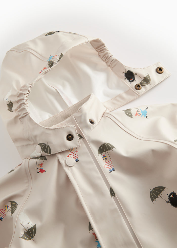 Beige baby raincoat with Moomin print, hat, and booties.