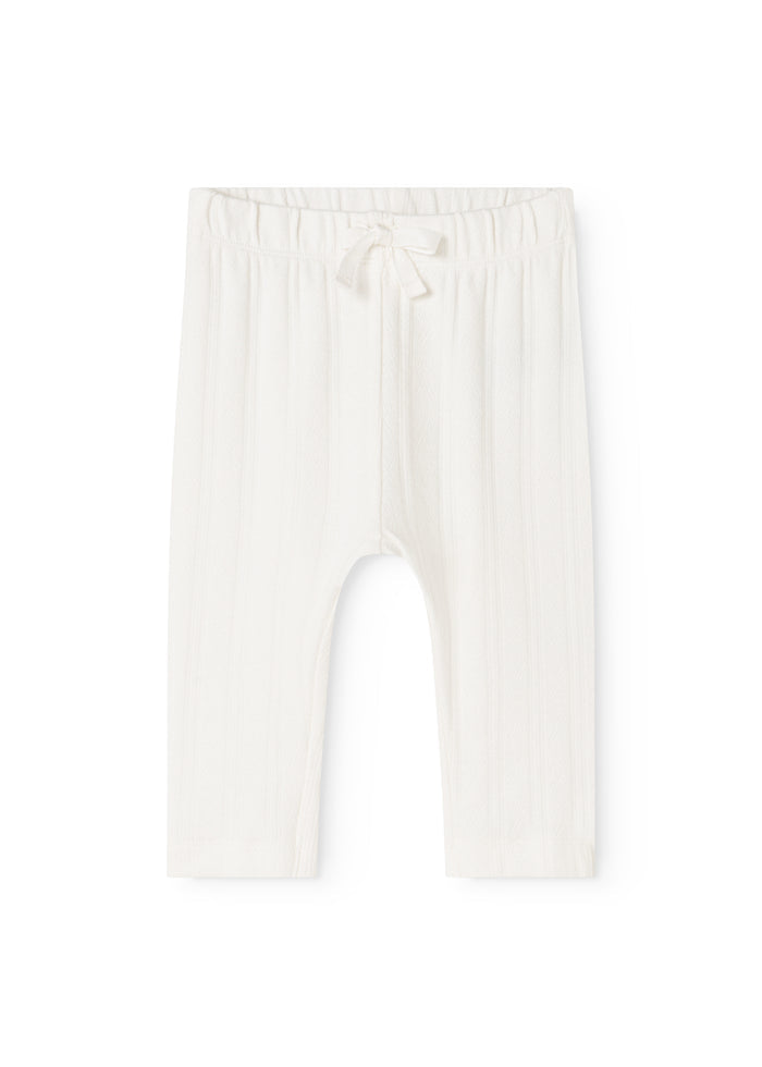 White baby pants from Pitti with elastic waist and front bow.