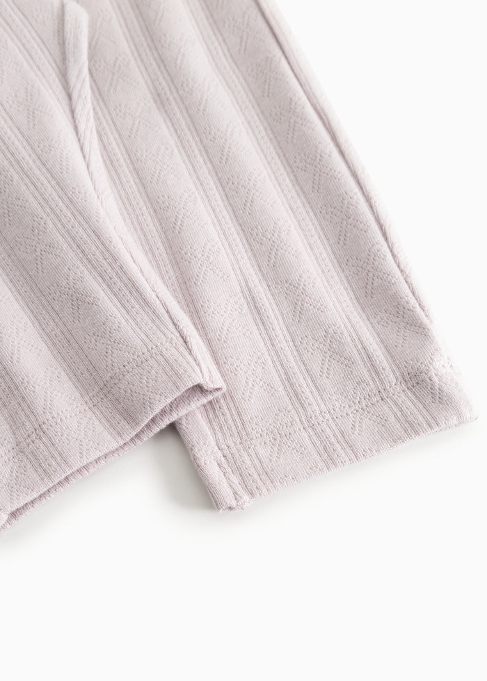 Pants from Pitti in light violet with cuff at the ankle and visible seam.