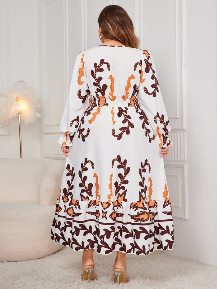 Back view of plus size honey print dress for women with long sleeves and flowy skirt by Trendsi