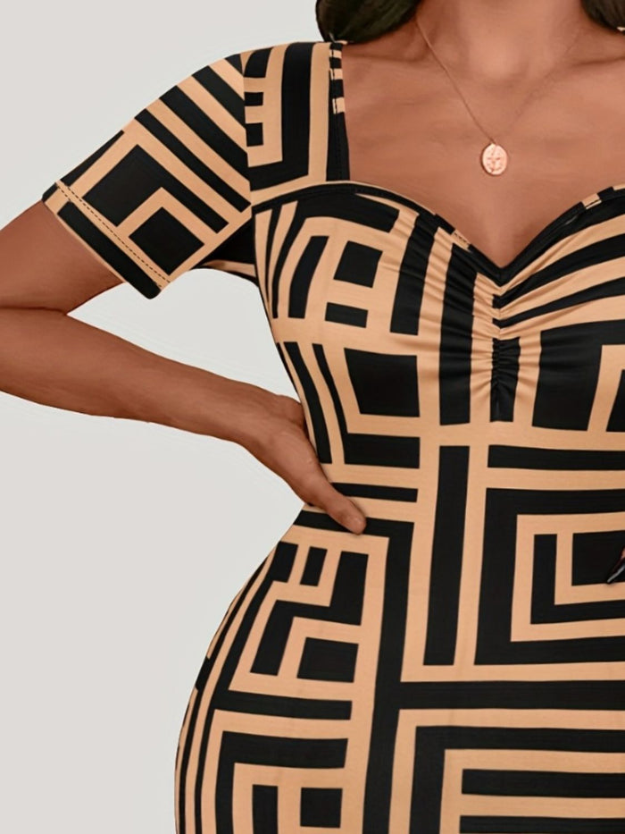 Plus size sweetheart neck mini dress with bold geometric print and short sleeves