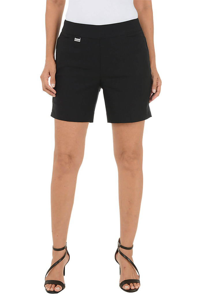 Black shorts worn by a person on a white background