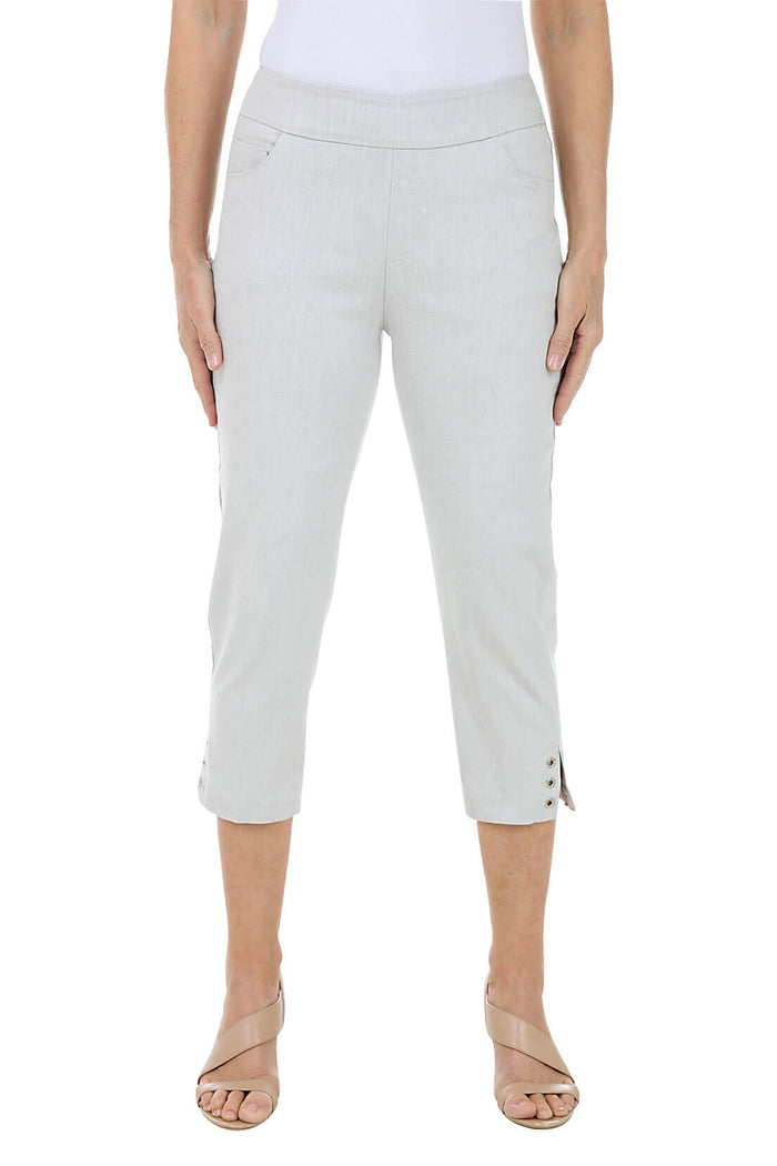 Light gray capri pants worn by a person on a white background