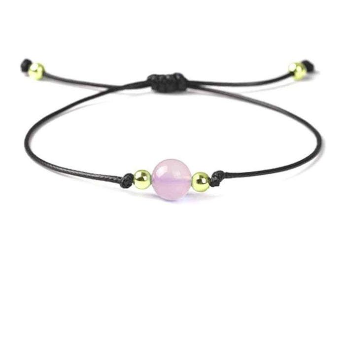 Rose quartz birthstone bracelet for January, soft pink natural stone
