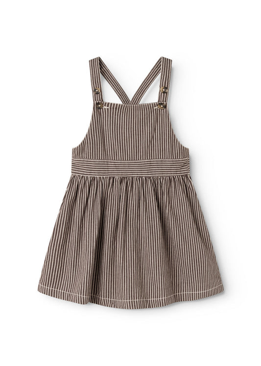 Dark brown striped dress with cross straps and pleated skirt.