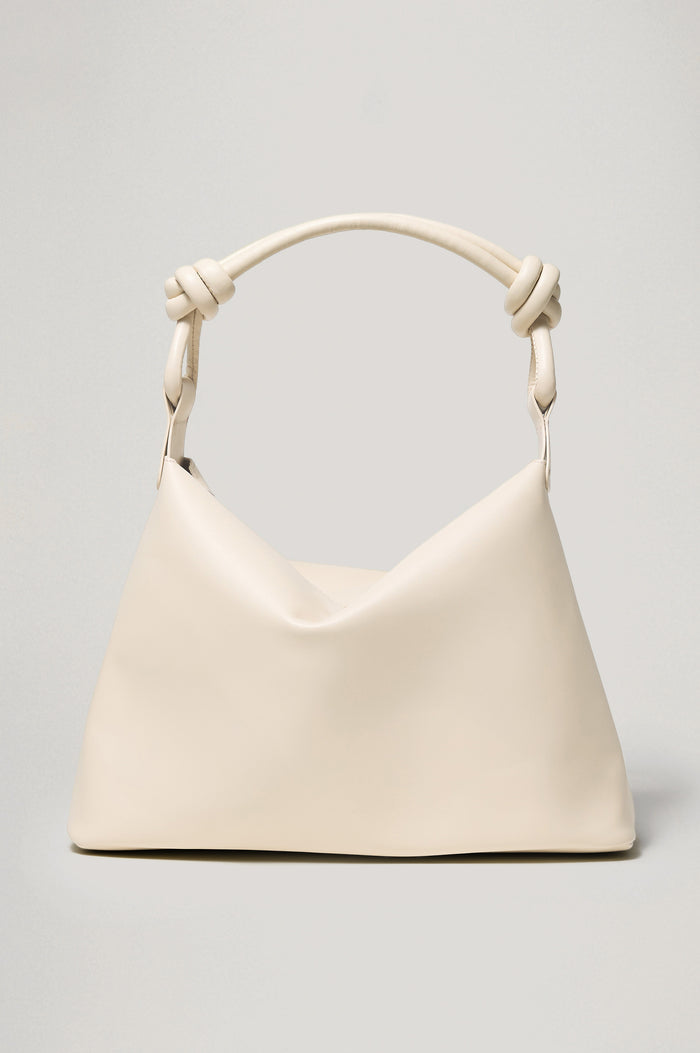 Siena Slouchy Hobo Bag in Italian Leather With Knotted Top Strap, Zipper Closure With Fringe Tassel And Interior Snap Button Slip Pocket in Bone Colorway - Front View Featured