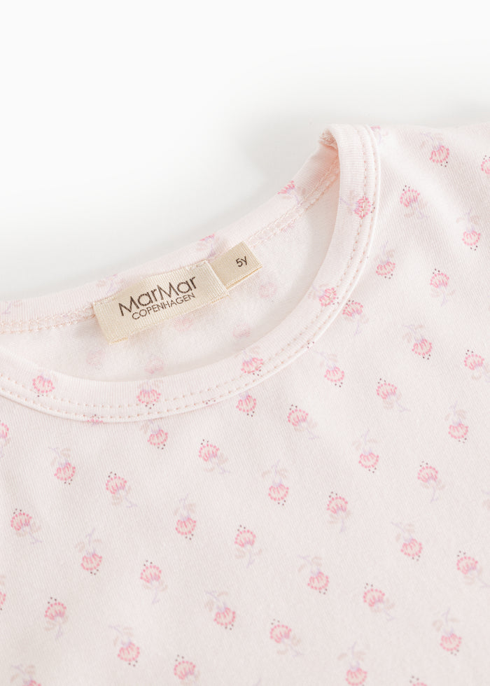 Long-sleeved nightgown with round neckline and mini floral print, visible brand label.