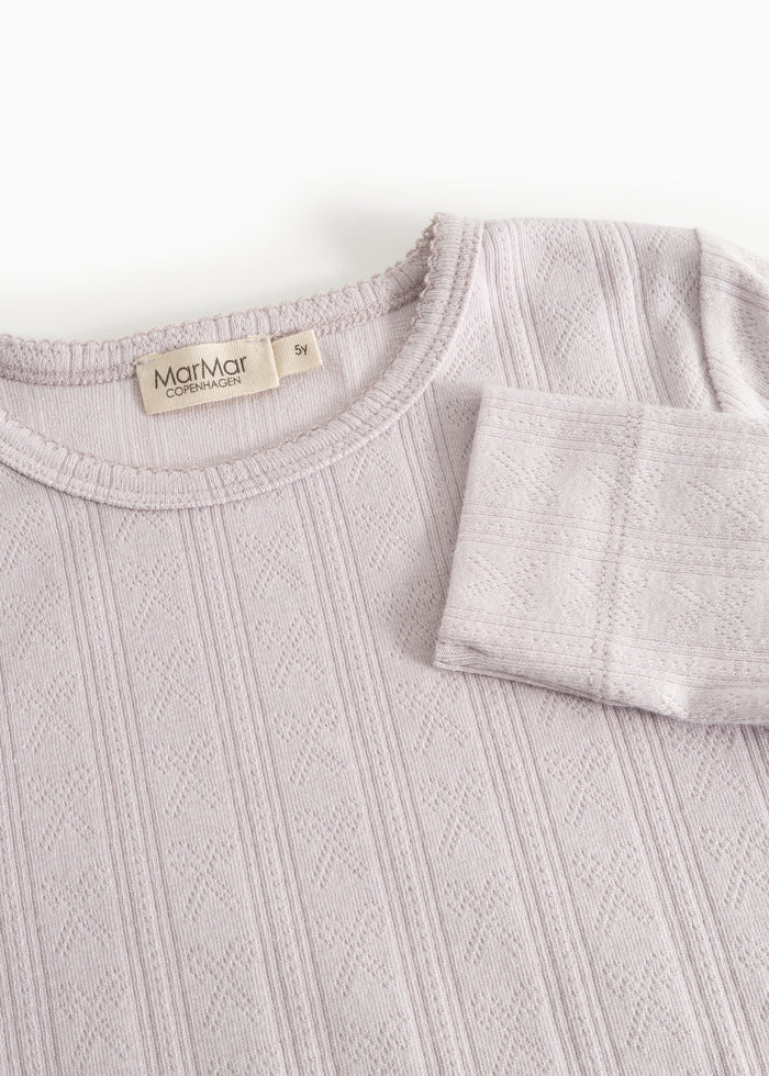 Baby pajamas in light lilac with a round neckline and MarMar Copenhagen brand.