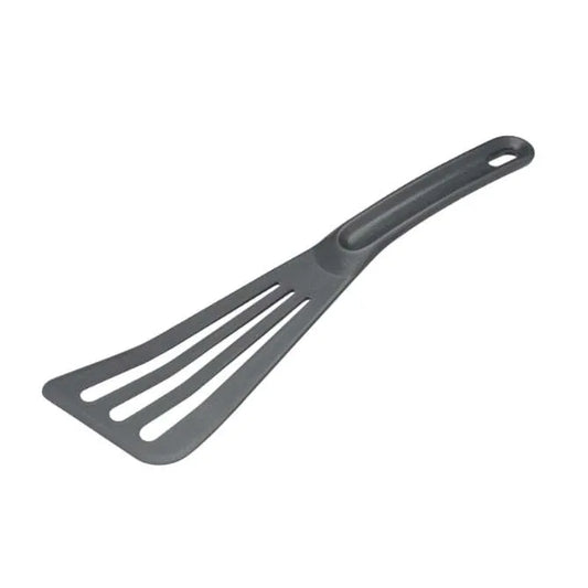 A black slotted spatula designed for professional kitchen use, with a flexible edge and slotted design for turning fish or omelets and draining fat.