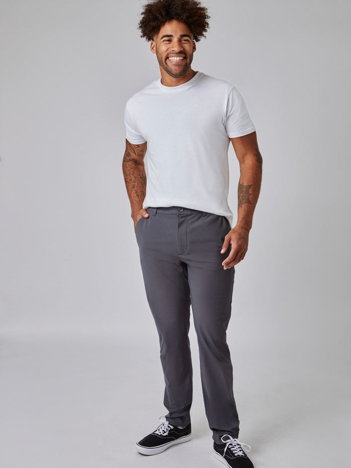 Joe is 6', 180LBS and wears a size 32x30 # Stretch Tech Pant Monochrome Black and Graphite 2-Pack | Fresh Clean Threads