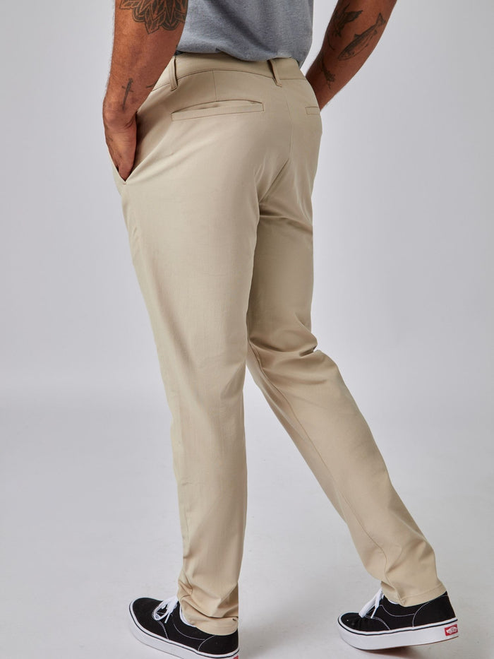 Joe is 6', 180LBS and wears a size 32x30 # Stretch Tech Pants Staples 2-Pack | Zip Pocket Details | Fresh Clean Threads