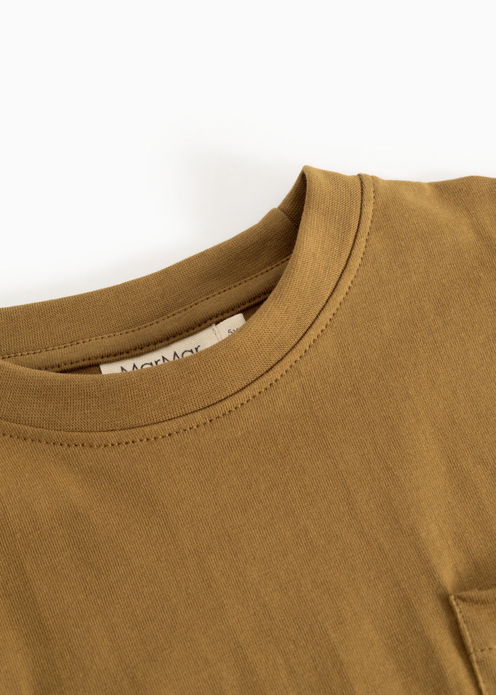 Caramel brown blouse with round neckline and visible seam at the collar