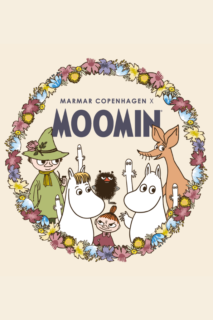 Blouse with a large Moomin scout motif in a floral frame in front.