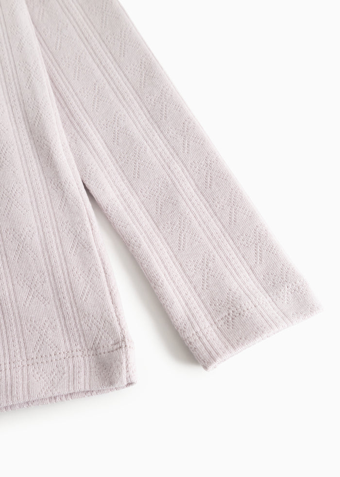 Sleeve children's T‑shirt in light purple with a nice textured pattern on the sleeve.