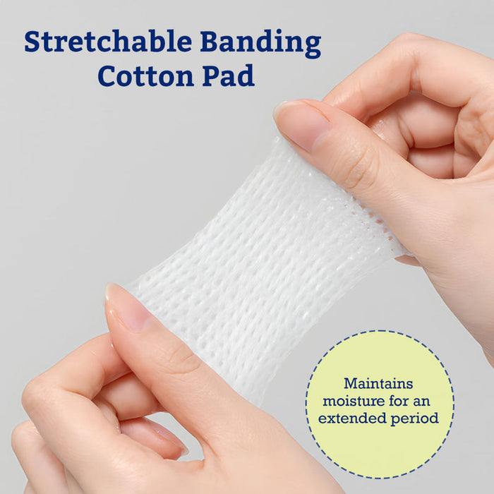 Hands stretching a white cotton pad showing its stretchable banding feature, highlighting moisture retention, for the Teca Cooling Pad | Leaders product.