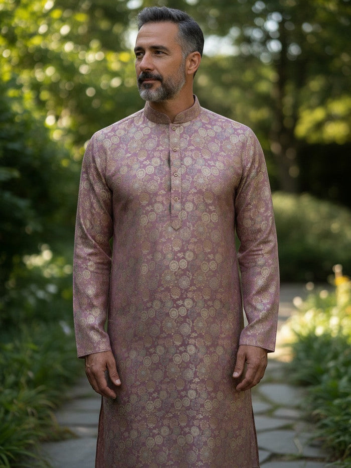 Kurti Connection USA men's mauve kurta with gold floral motifs, mandarin collar, and button-down placket in a garden.