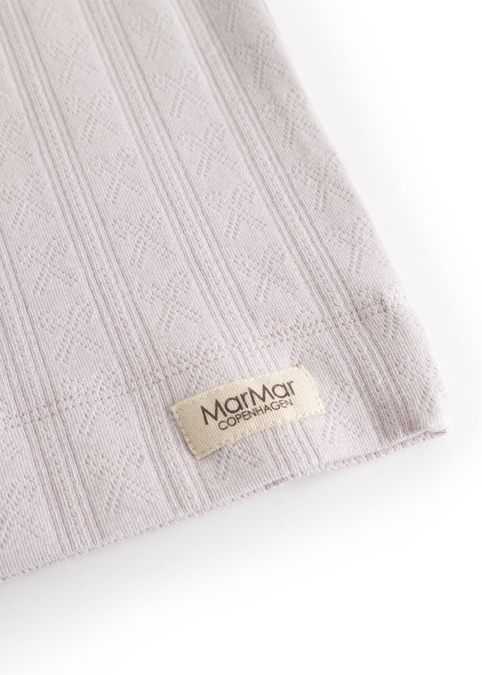 Marmar Copenhagen underwear: textured fabric and logo label on light purple top