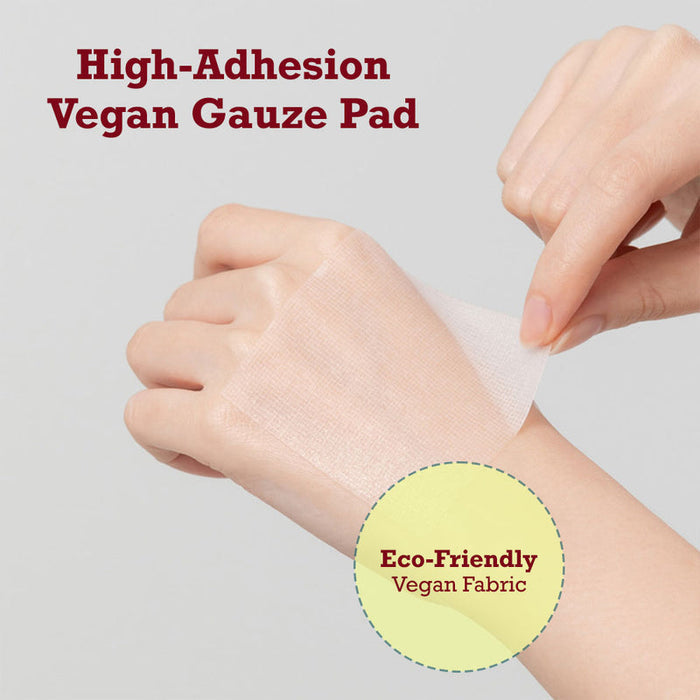 A person's hand with a transparent high-adhesion vegan gauze pad being applied, highlighting the eco-friendly vegan fabric of the Vita Blemish Pad | Leaders for skincare use.