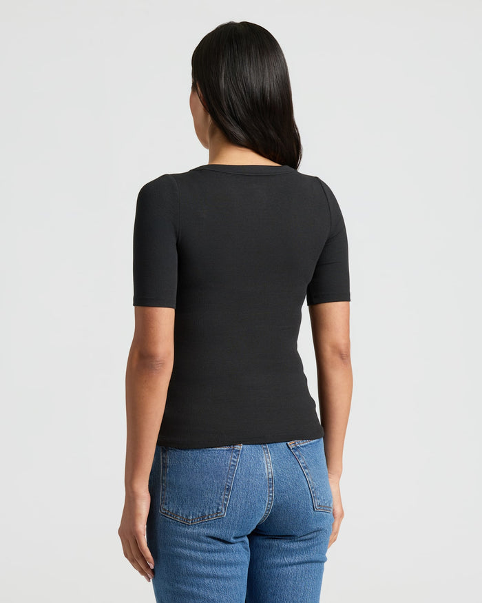Womens Black Ribbed 3/4 Sleeve Scoop Neck Tee 3-Pack worn from behind.