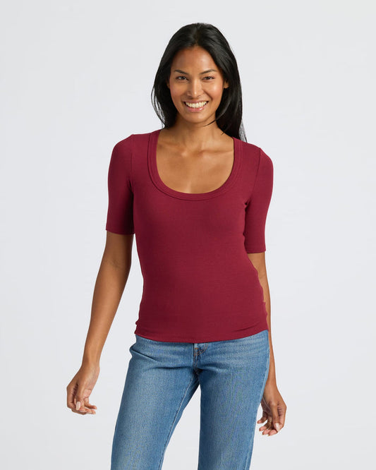 Woman in Womens Dark Maroon Ribbed 3/4 Sleeve Scoop Neck Tee. MODEL_INFO: Candy is 5'9", wearing a size S