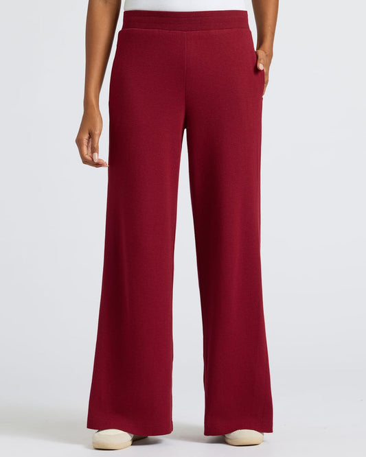Women's Dark Maroon Waffle Leg Pant modeled, showcasing relaxed fit and pockets.