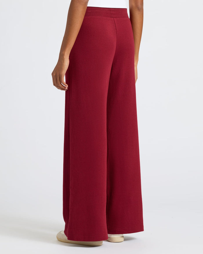 Womens Dark Maroon Waffle Wide Leg Pants, shown from the back.