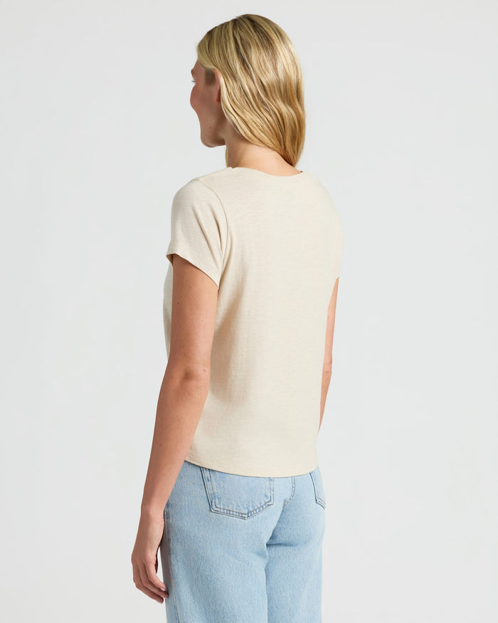 Woman in Womens Oatmeal Slub Scoop Neck Tee 4-Pack and jeans.