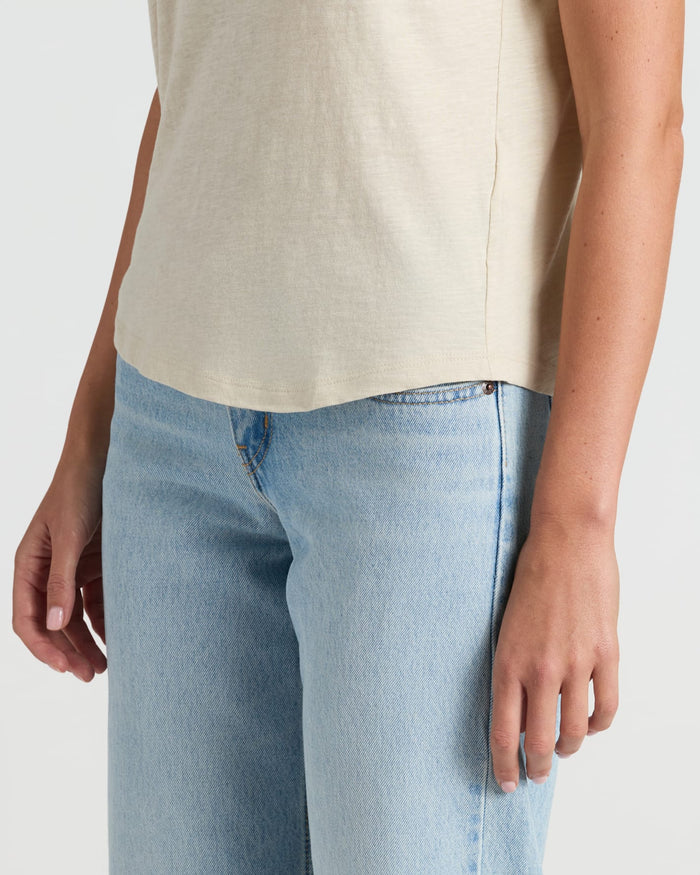 Midsection view wearing Womens Oatmeal Slub Scoop Neck Tee, tucked into jeans.