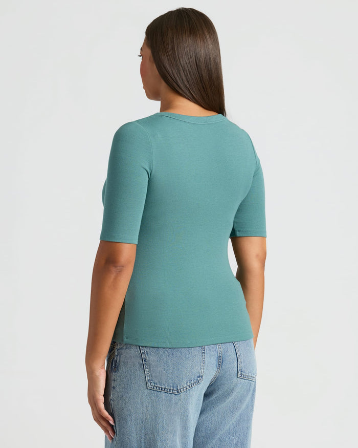 Back view of woman in Womens Stormcloud Ribbed 3/4 Sleeve Scoop Neck Tee.