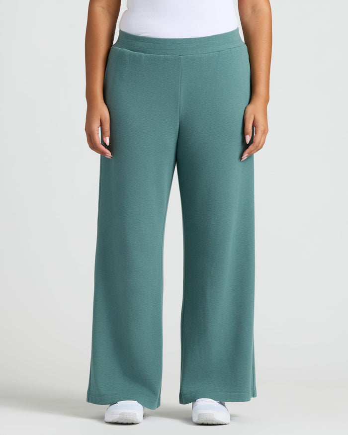 Womens Stormcloud Waffle Pant with white tank and sneakers.