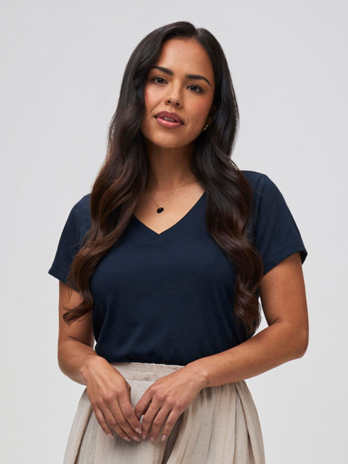 Nathalie is 5'6" and wears a size S # Women's Dark Navy V-Neck | Women's Collection at Fresh Clean Threads